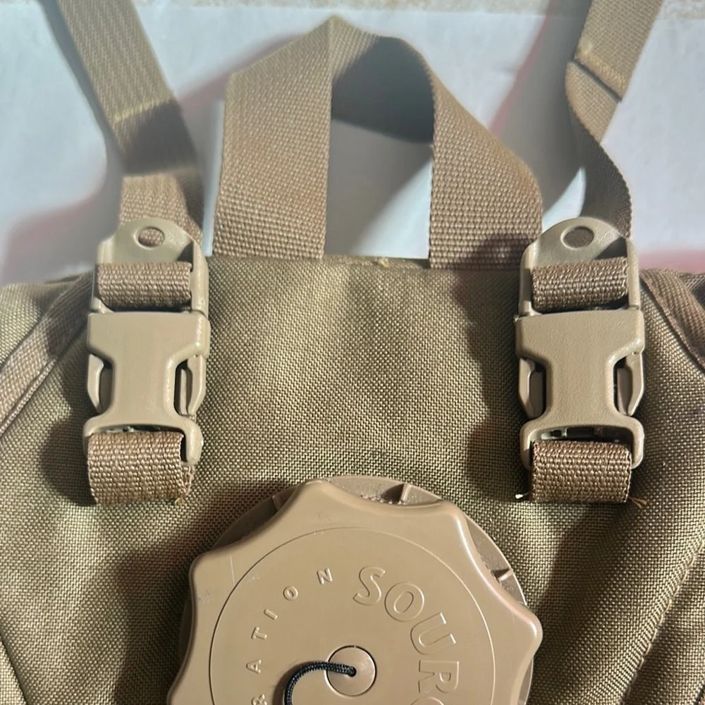 Tan Backpack with Padded Straps and Durable Fabric
